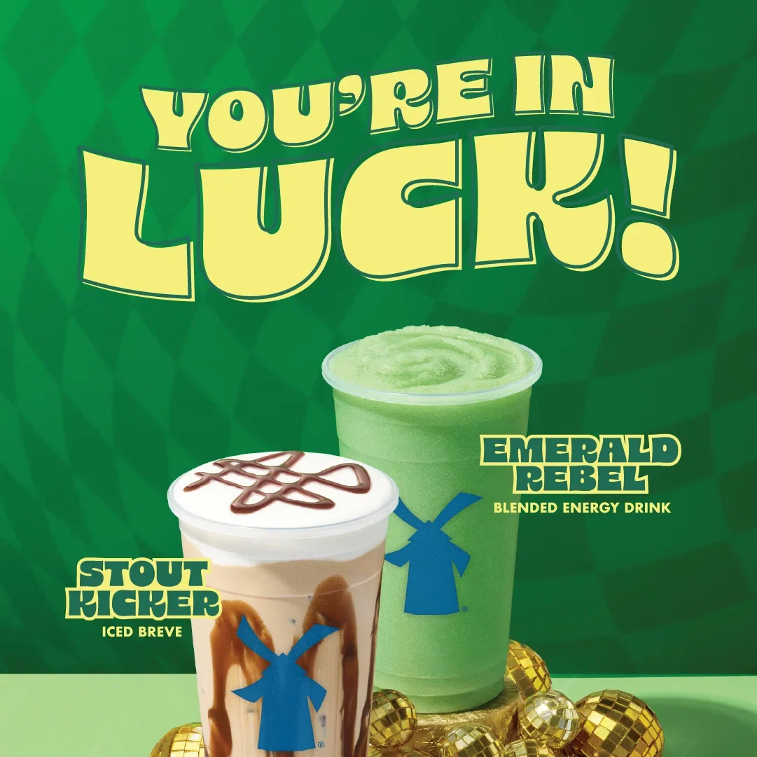 "You're in LUCK!" advertisement showing Stout Kicker iced breve and Emerald Rebel energy drink with blue windmill logos on green background.