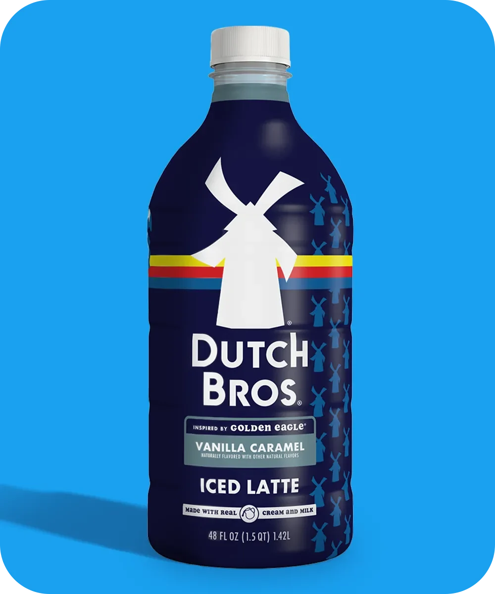 Navy blue bottle of Dutch Bros Vanilla Caramel Iced Latte with windmill logo on bright blue background.
