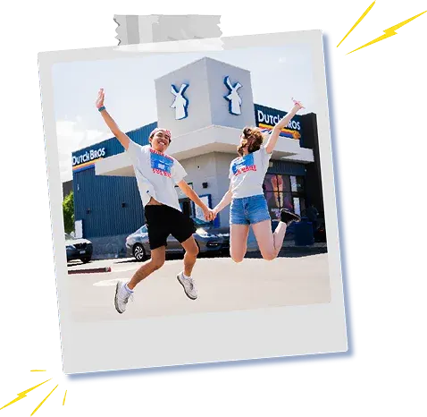 People jumping in front of Dutch Bros